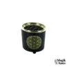 Un brûleur d'encens cylindrique noir avec un motif doré de la Fleur de Vie, posé sur un fond blanc épuré.L'image est une vue frontale du produit pour une clarté optimale.